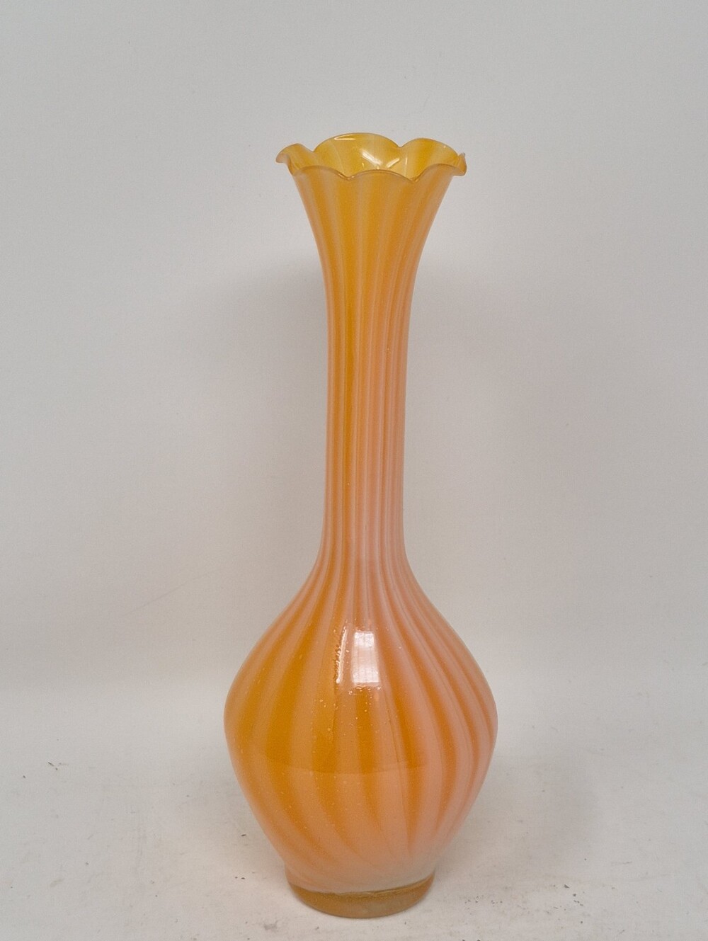 Orange Glasd Bud Vase With White White Swirl